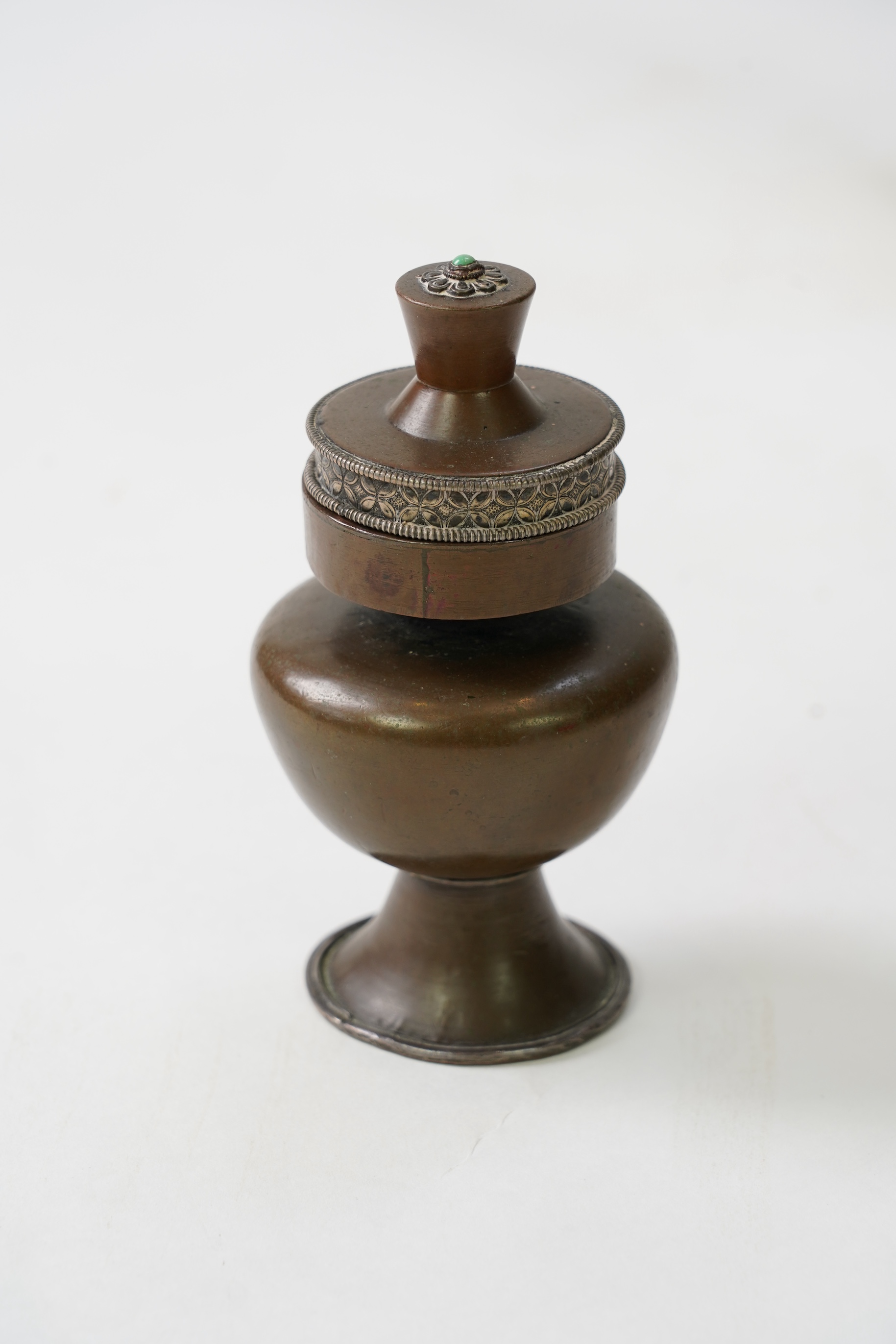 A Tibetan copper and silver mounted ink-stand, 19th century